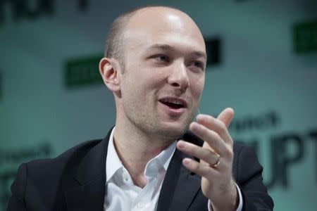 Logan Green, co-founder and CEO of Lyft, speaks during the TechCrunch Disrupt event in New York May 5, 2015. REUTERS/Brendan McDermid