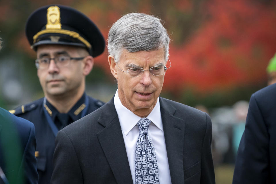 Ambassador William Taylor, is escorted by U.S. Capitol Police as he arrives to testify before House committees as part of the Democrats' impeachment investigation of President Donald Trump, at the Capitol in Washington, Tuesday, Oct. 22, 2019. (AP Photo/J. Scott Applewhite)