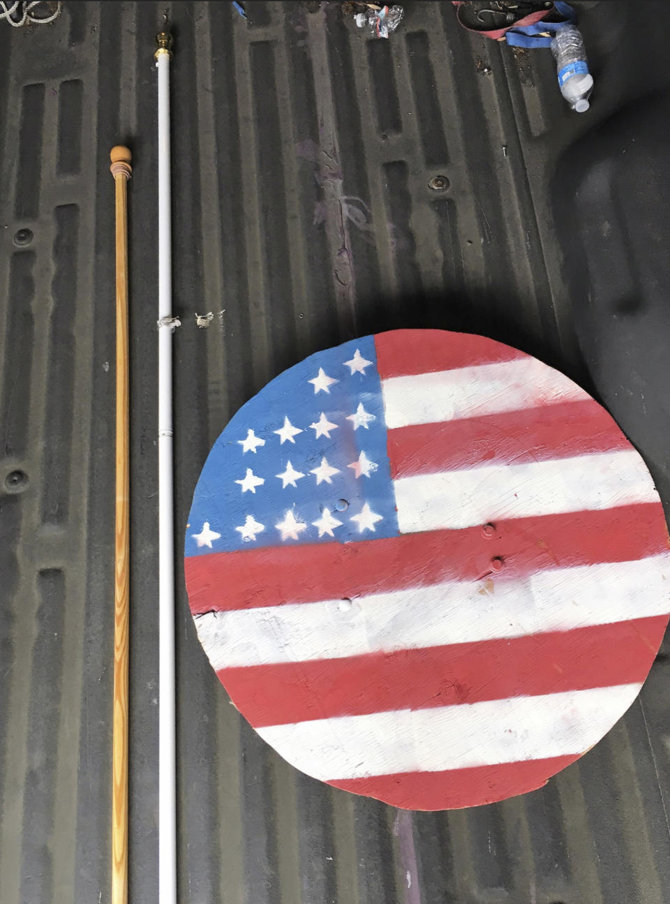 This photo provided by the Portland, Ore. Police shows a metal shield seized by the Portland police before a protest in downtown Portland, Ore., on Saturday, Aug. 17, 2019.  Flag-waving members of the Proud Boys and Three Percenters militia group began gathering late in the morning, some wearing body armor and helmets. Meanwhile black clad, helmet and face-mask wearing anti-fascist protesters were also among the several hundred people on the streets.   ( Portland, Ore. Police via AP)