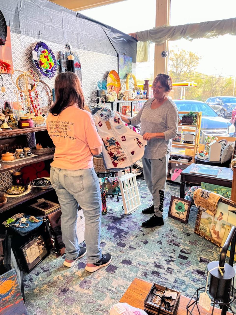 Vendor Marta, who runs Millene's Offbeat Designs, shows Tara Allen some of her items for sale. 
Tara Allen turned the former Frugality Thrift Store on Edgemoor Road in Powell, Tennessee, into The ReSale Rack Thrift Store on Oct. 1, 2023.