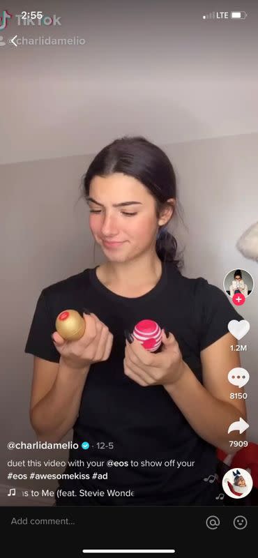 A screengrab shows a video of TikTok creator Charli DÕAmelio taking part in a holiday marketing campaign on TikTok for beauty brand eos Products