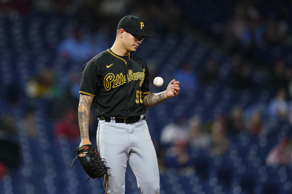 Pittsburgh Pirates pitcher Anthony Banda tosses a baseball during the sixth inning of a baseball game against the Philadelphia Phillies, Thursday, Sept. 23, 2021, in Philadelphia. (AP Photo/Matt Slocum)