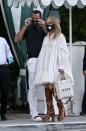 <p>To catch dinner with her beau A Rod, J Lo stepped out in the perfect date night outfit, consisting of knee-high platform boots, an oversized shirt mini dress, a star mask, and a Coach bag with the encouragement 'VOTE' on its side. </p><p>Over the weekend the loved-up pair dressed up for <a href="https://www.elle.com/uk/fashion/trends/g16320/celebrity-halloween-costumes/" rel="nofollow noopener" target="_blank" data-ylk="slk:Halloween;elm:context_link;itc:0;sec:content-canvas" class="link ">Halloween</a>, with Lopez as Queen of Pop Madonna, and Rodriguez as Bruce Springsteen.</p><p><a class="link " href="https://www.selfridges.com/GB/en/cat/coach-tabby-pebbled-leather-shoulder-bag_1045-3005401-73995B4HA/" rel="nofollow noopener" target="_blank" data-ylk="slk:SHOP COACH BAG;elm:context_link;itc:0;sec:content-canvas">SHOP COACH BAG</a></p>