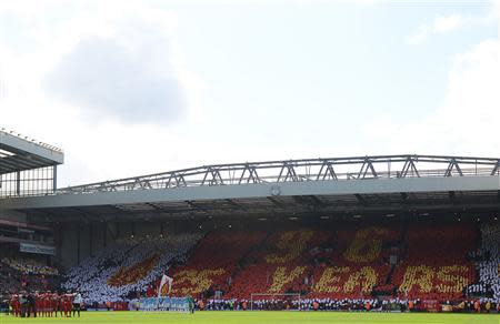 Liverpool fans hold up a banner in respect of the Hillsborough disaster ahead of their English Premier League soccer match against Manchester City at Anfield in Liverpool, northern England April 13, 2014. REUTERS/Nigel Roddis