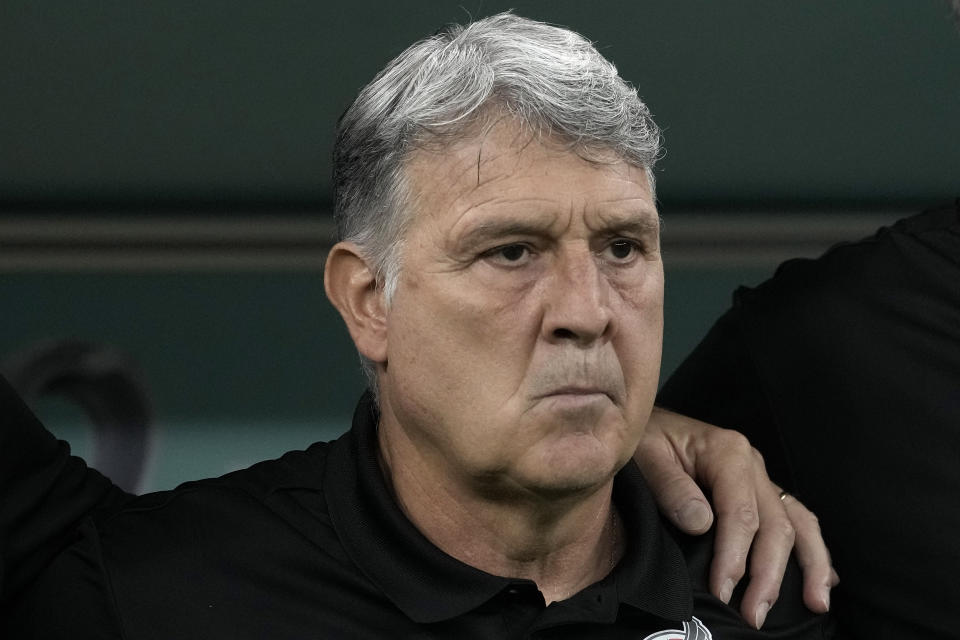 Mexico's head coach Gerardo Martino watches his team during the World Cup group C soccer match between Saudi Arabia and Mexico, at the Lusail Stadium in Lusail, Qatar, Wednesday, Nov. 30, 2022. (AP Photo/Moises Castillo)