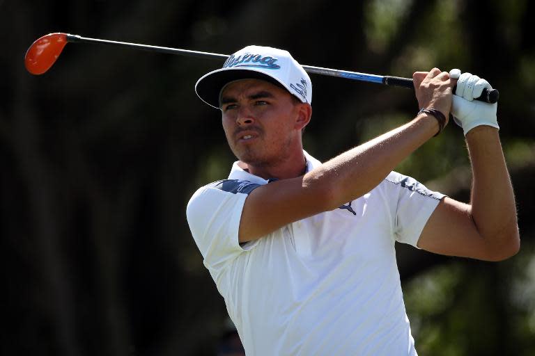 Rickie Fowler of the US hits a tee shot on the fifth hole during the first round of the World Golf Championships-Cadillac Championship, at Trump National Doral Blue Monster Course in Florida, on March 5, 2015