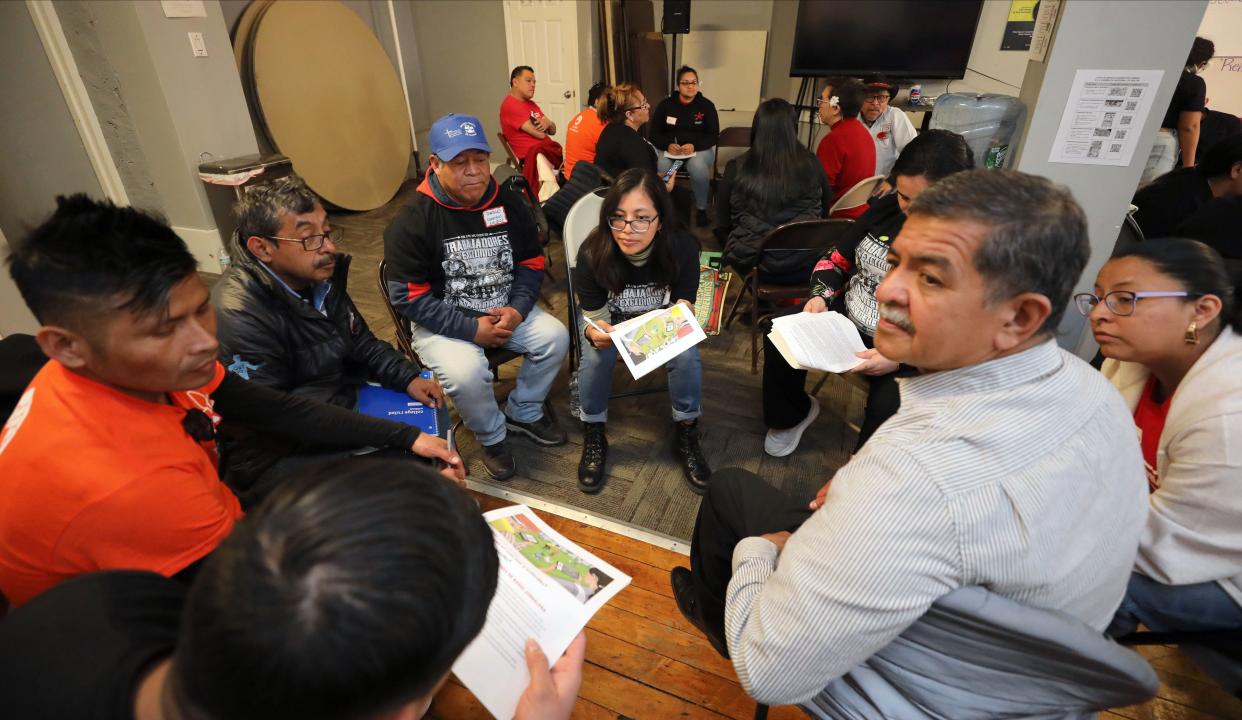 Diana Sanchez, center, the regional coordinator for the National Day Laborers Network, works with a small group of members from New York, New Jersey, Connecticut and Massachusetts during a meeting at the United Community Center of Westchester in New Rochelle, April 6, 2024.
