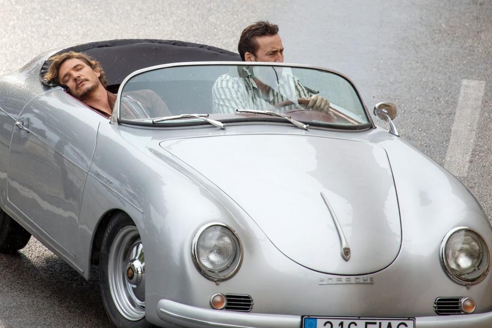 <p>Nicolas Cage and Pedro Pascal take a ride in a silver Porsche while filming <em>The Unbearable Weight of Massive Talent </em>in Dubrovnik, Croatia on Wednesday. </p>