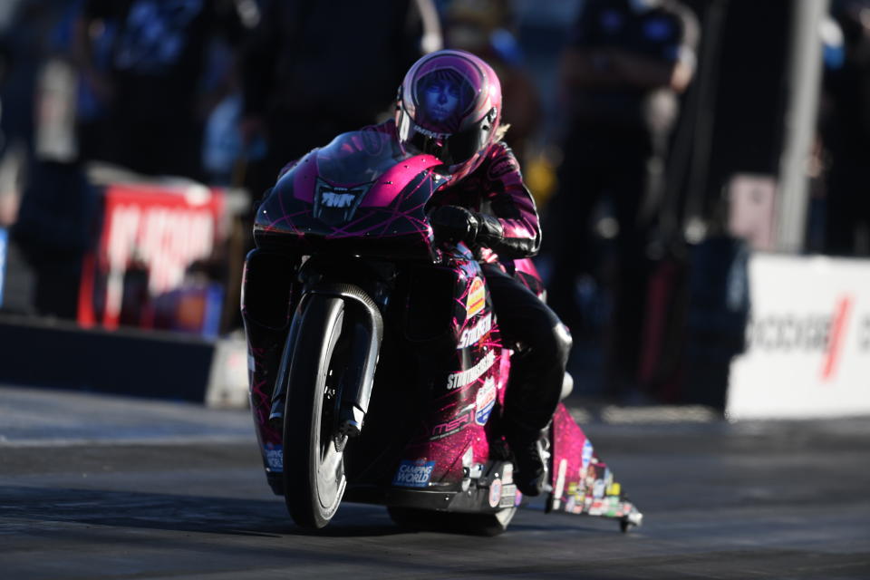 In this photo provided by the NHRA, Pro Stock Motorcycle's Angie Smith raced to her first win since 2014 in the final round at The Strip at Las Vegas Motor Speedway thanks to her run of 6.917 seconds at 194.83 mph, Sunday, Nov. 1, 2020, in Las Vegas. (Jerry Foss/NHRA via AP)
