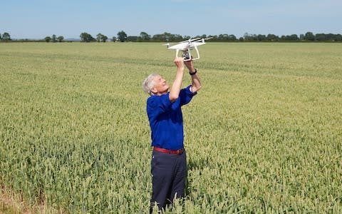 Dyson gets to grips with one of the farm’s drones.   - Credit: Tina Hillier