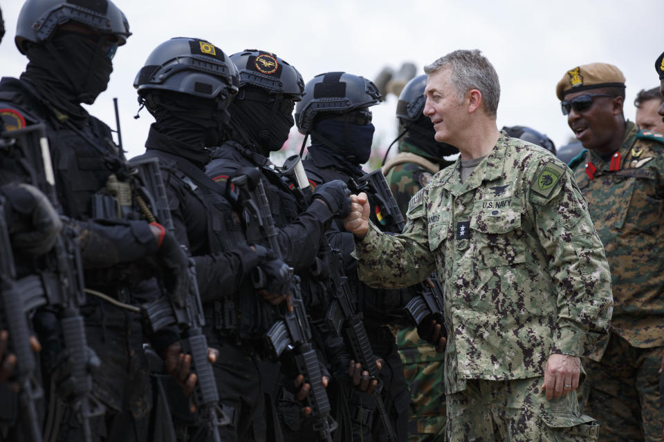 Rear Admiral Milton Sands, Commander of the U.S. Special Operations Command Africa (SOCAF) greets Ghanaian soldiers during Flintlock 2023 at Sogakope beach resort, Ghana, Tuesday, March 14, 2023. As extremist violence in West Africa's Sahel region spreads south toward coastal states, the United States military has launched its annual military training exercise which will help armies contain the jihadi threat. Soldiers from several African countries are being trained in counter-insurgency tactics as part of the annual U.S.-led exercise known as Flintlock. (AP Photo/Misper Apawu)