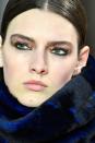 <p><strong>Trend: gold accents</strong></p><p>Touches of gold leaf were scattered across the brow bone of the models at Akris, adding a textured edge to their boyish brows, kohl-rimmed eyes and naturally-flushed skin. </p>