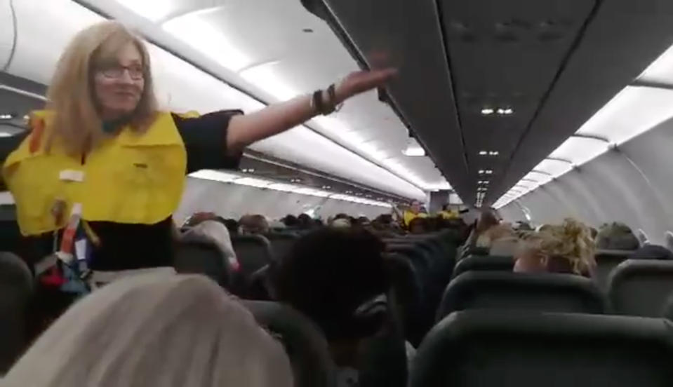 This video shows the ‘world’s funniest’ flight attendant leaving 150 passengers in stitches with his snarky safety announcement. Photo: Caters News