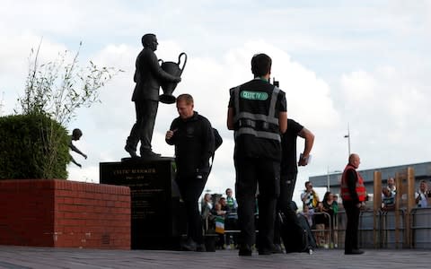 Neil Lennon by the Jock Stein statue - Credit: Action Images via Reuters&nbsp;