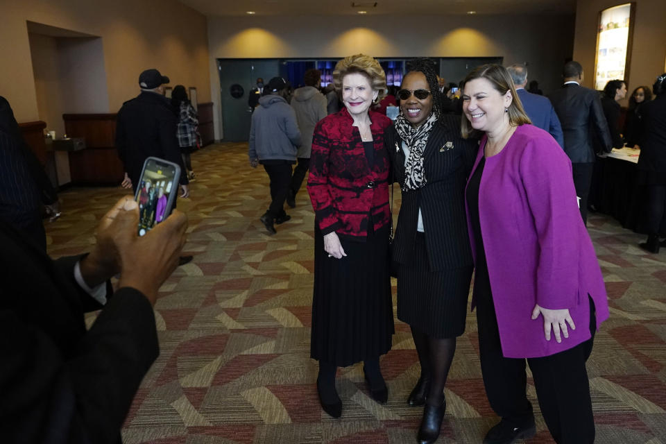 Sen. Debbie Stabenow, D-Mich., left, and Rep. Elissa Slotkin pose for a photograph, Monday, Jan. 16, 2023, in Lansing, Mich. Rep. Slotkin is taking steps toward seeking the U.S. Senate seat held by Stabenow who is retiring. Slotkin has quickly shifted from fighting for her political life in the nation's third most-expensive U.S. House race last year to "at the very top" of the Michigan Democrats readying for a 2024 Senate campaign. (AP Photo/Carlos Osorio)