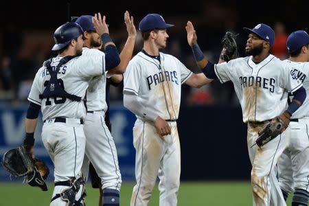 Sep 21, 2017; San Diego, CA, USA; The San Diego Padres celebrate a 3-0 win over the Colorado Rockies at Petco Park. Mandatory Credit: Jake Roth-USA TODAY Sports