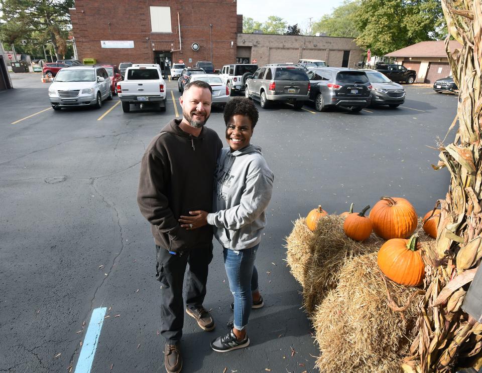 Britton Boone and his wife, Pastor Heather Boone of Oaks of Righteousness Christian Ministries, stand outside the church during a busy day at Oaks Village recently. The couple are making plans to leave Monroe County.