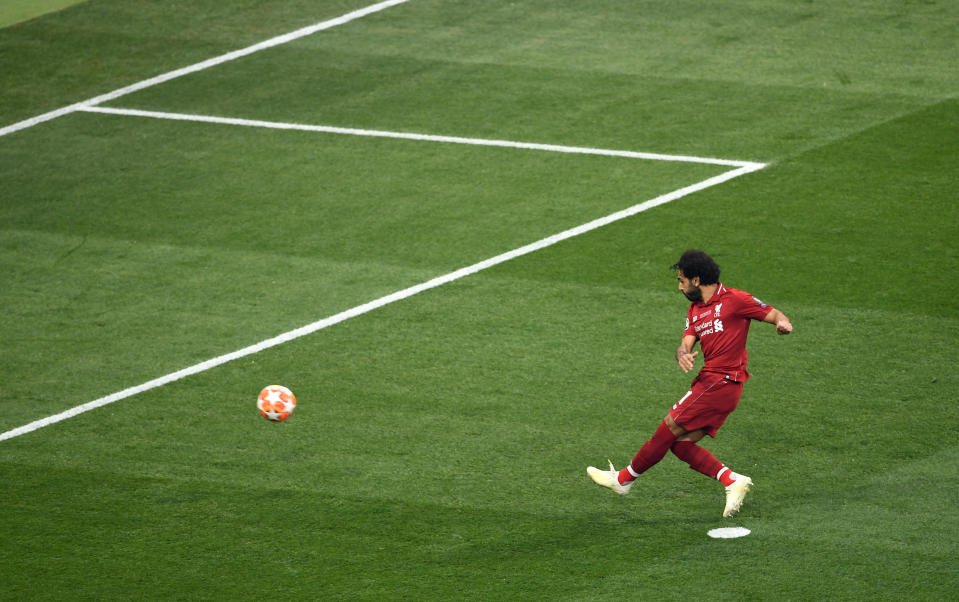 Liverpool's Mohamed Salah scores the opening goal from the penalty spot during the UEFA Champions League Final at the Wanda Metropolitano, Madrid.