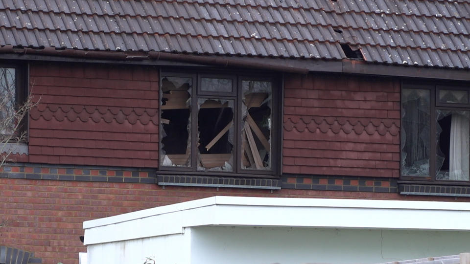 Damage to a property in Grovelands Road, Reading, where one person has died and others are 