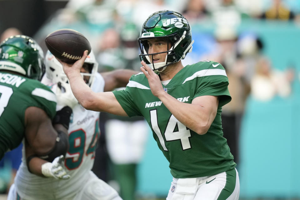 New York Jets quarterback Trevor Siemian (14) aims a pass during the second half of an NFL football game against the Miami Dolphins, Sunday, Dec. 17, 2023, in Miami Gardens, Fla. (AP Photo/Rebecca Blackwell)