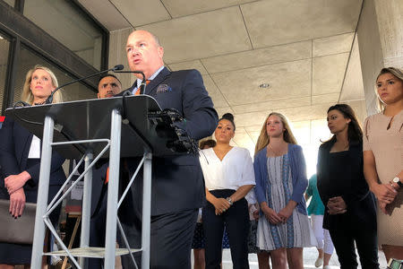 Attorney John Manley, who represents several gymnasts abused by a disgraced former USA Gymnastics team doctor, speaks at a news conference calling on Texas to step up its investigation of a training facility used by the national team in the state in Austin, Texas, U.S., May 10, 2018. REUTERS/Jon Herskovitz