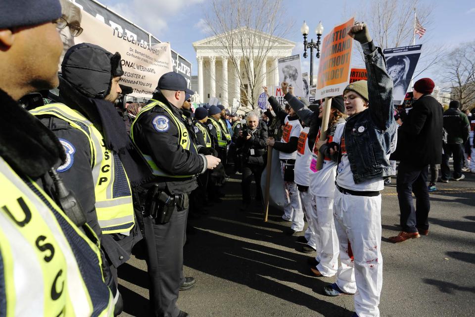Pro-choice protesters block way of anti-abortion March for Life at U.S. Supreme Court building in Washington