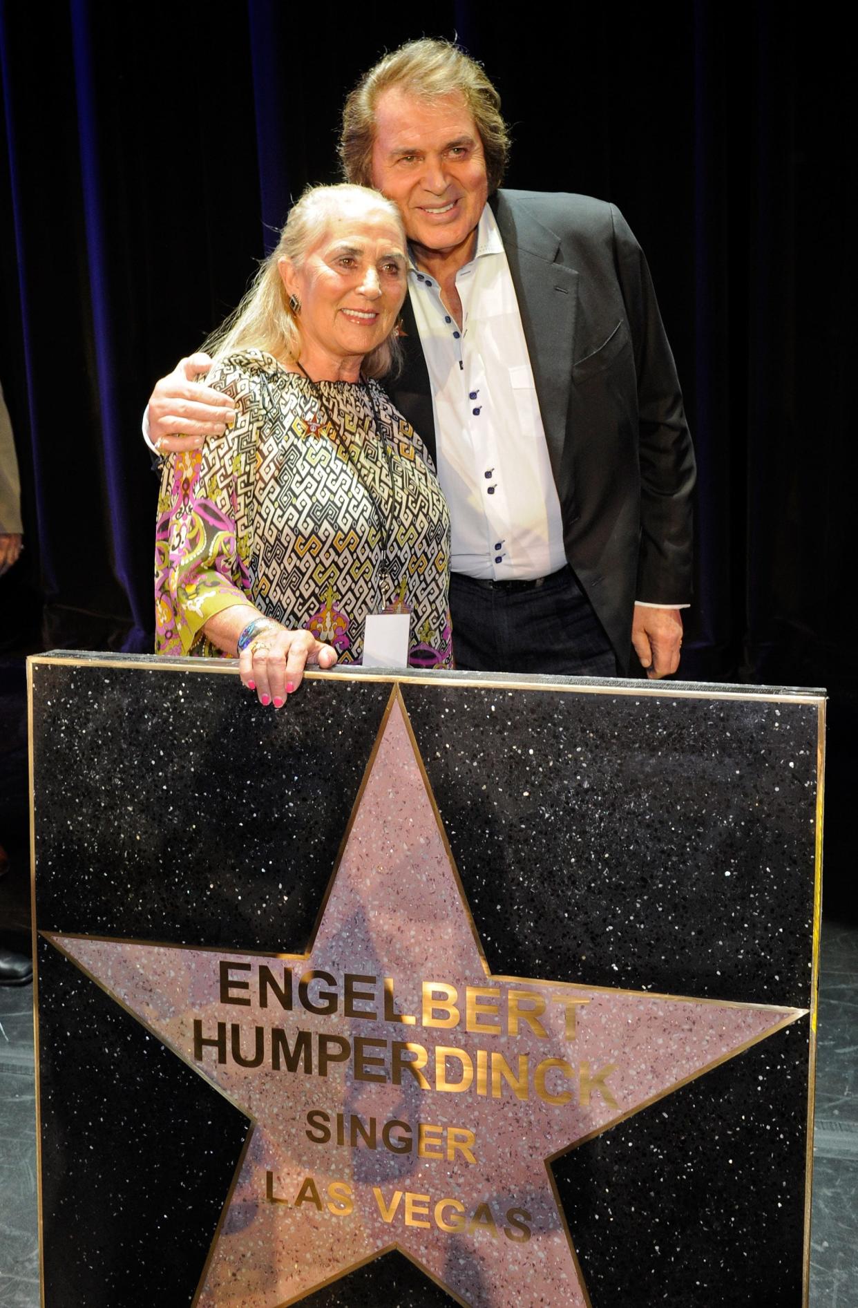 Engelbert Humperdinck and wife Patricia Healey appear with his star at the Paris Las Vegas during Humperdinck's Las Vegas Walk of Stars dedication ceremony on July 20, 2011.