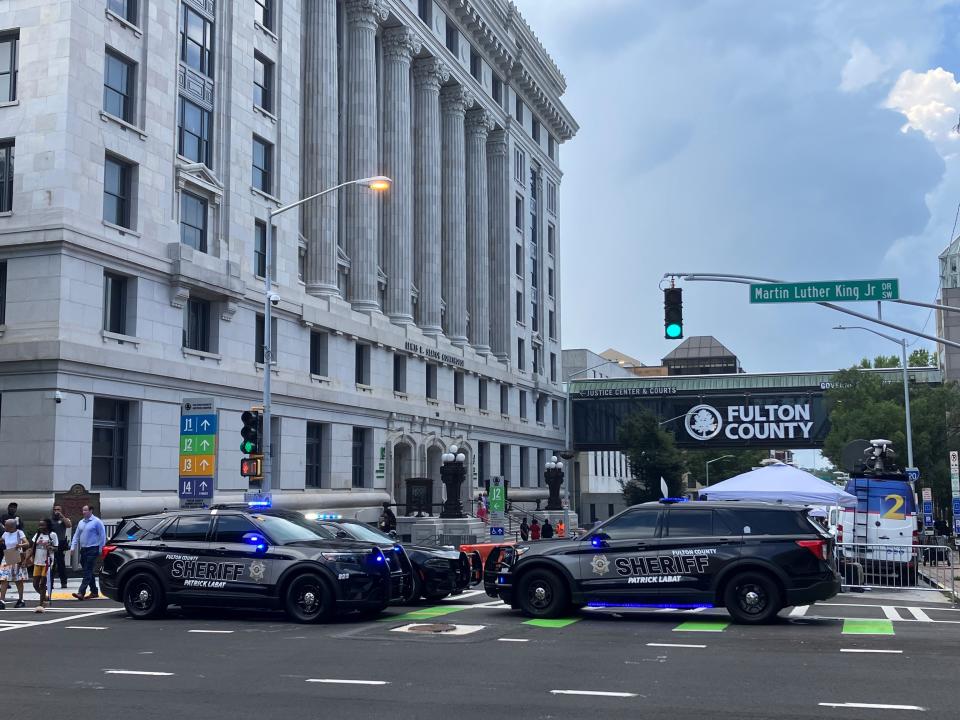 Pryor Street in Atlanta was blocked off Tuesday in front of the Lewis R. Slaton Courthouse in Atlanta, where on Monday evening a grand jury indicted former president Donald J. Trump