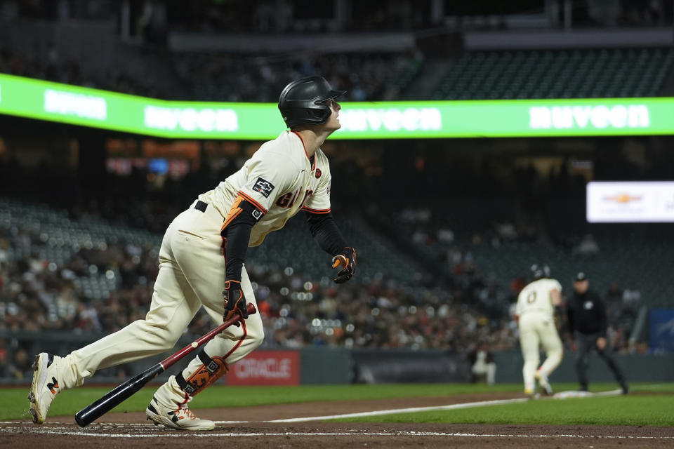 San Francisco Giants' Mike Yastrzemski watches his three-run home run during the second inning of a baseball game against the Milwaukee Brewers, Wednesday, Sept. 11, 2024, in San Francisco. (AP Photo/Godofredo A. Vásquez)