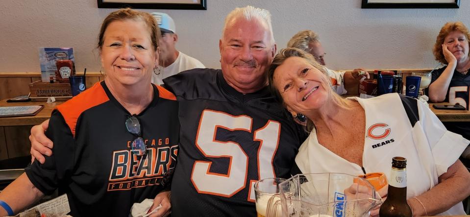 Mitch Pacyna watches his last Bears game with his wife, Mary Pacyna (white shirt, right) and their friend Kathy (Bears shirt, left).