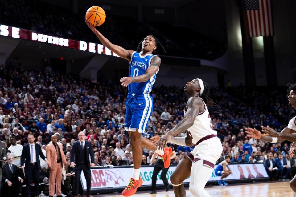 Kentucky Wildcats guard Rob Dillingham (0) drives to the basket against the Texas A&M Aggies during the game at Reed Arena in College Station, Tx, Saturday, January 13, 2024.