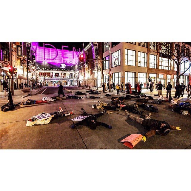 In this photo from Instagram user knoweroftheledge, protestors lay in the street for 4 1/2 minutes to represent the 4 1/2 hours Mike Brown laid in the street when he was killed.  Tuesday, November 25, 2014