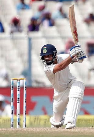 Cricket - India v New Zealand - Second Test cricket match - Eden Gardens, Kolkata - 02/10/2016. India's Virat Kohli plays a shot. REUTERS/Rupak De Chowdhuri