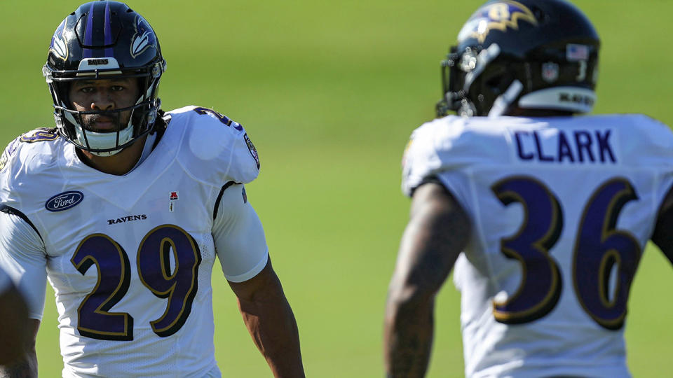 Earl Thomas III, left, and Chuck Clark, right, are pictured during the Baltimore Ravens' training camp.