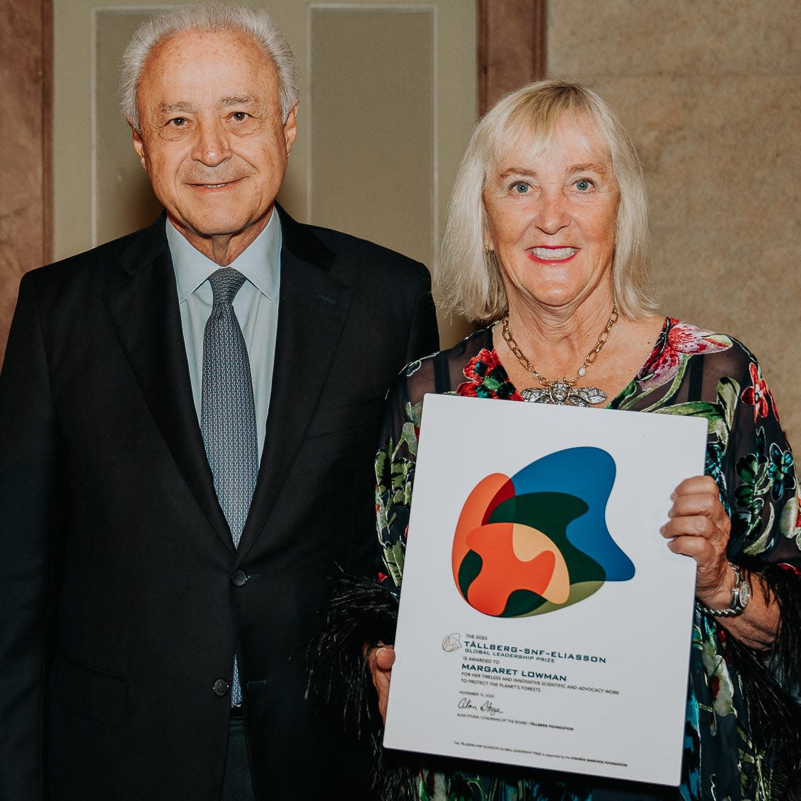 Meg Lowman, executive director of the Sarasota-based TREE Foundation, receives the 2023 Tällberg-SNF-Eliasson Global Leadership Prize from Vassilis Kaskarelis, former Ambassador of Greece to the United States.