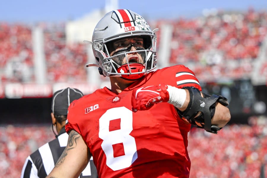 COLUMBUS, OHIO – OCTOBER 22: Tight end Cade Stover #8 of the Ohio State Buckeyes celebrates a first quarter catch against the Iowa Hawkeyes at Ohio Stadium on October 22, 2022 in Columbus, Ohio. (Photo by Gaelen Morse/Getty Images)