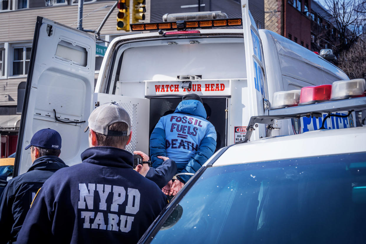 Climate activist getting arrested Erik McGregor/LightRocket via Getty Images