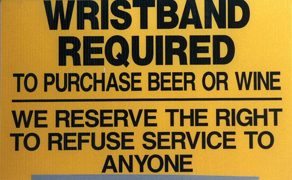 Sign on one of the Waterfront Association's beer sales booths on River St.