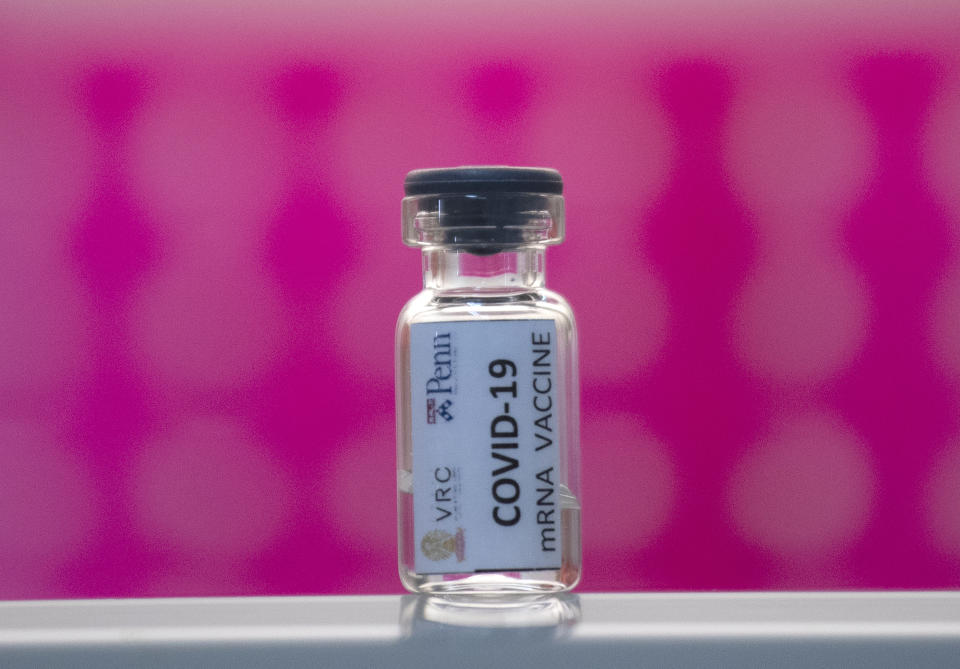 FILE - In this Monday, May 25, 2020 file photo, a vile of a COVID-19 vaccine candidate on a shelf during testing at the Chula Vaccine Research Center, run by Chulalongkorn University in Bangkok, Thailand. Refrigeration, cargo planes, and, above all, money: All risk being in short supply for the international initiative to get coronavirus vaccines to the world’s most vulnerable people. (AP Photo/Sakchai Lalit, File)