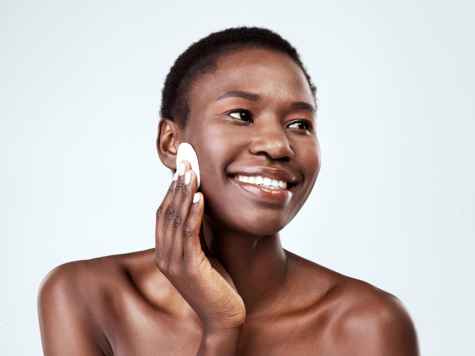 Using a toner right after cleansing ensures any leftover dirt, makeup and grime are removed. (Photo: PeopleImages via Getty Images)