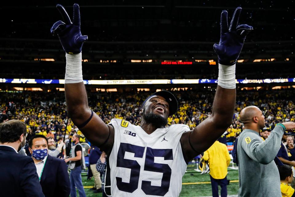 Michigan linebacker David Ojabo celebrates after the 42-3 win over Iowa in the Big Ten championship game on Saturday, Dec. 4, 2021, in Indianapolis.