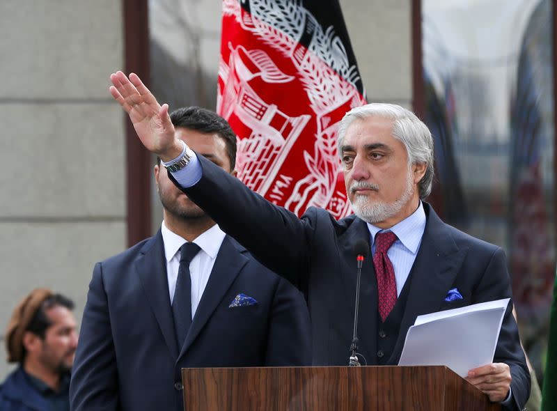 Afghanistan's former CEO Abdullah Abdullah gestures during a swearing-in ceremony of the new Afghanistan's President Ashraf Ghani, in Kabul