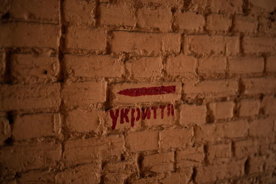 A signs reads “shelter” in a street of Kyiv, Ukraine (Copyright 2023 The Associated Press. All rights reserved)