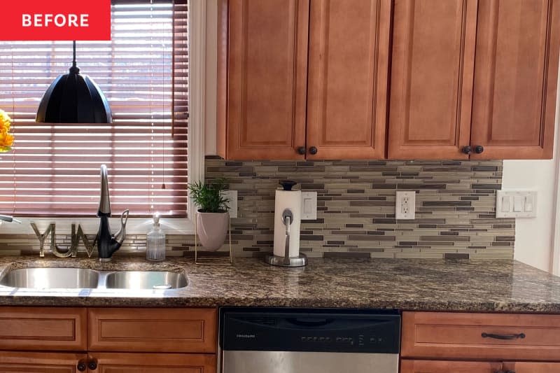 Tiled backsplash in kitchen before remodel.