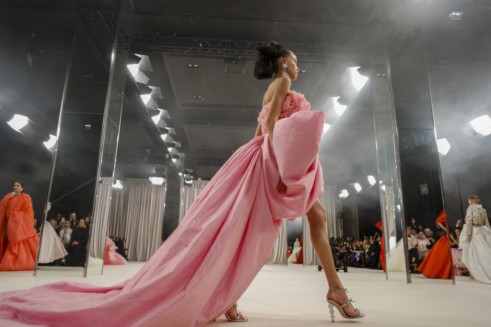 A model wears a creation as part of the Giambattista Valli Haute Couture Spring-Summer 2023 collection presented in Paris, Monday, Jan. 23, 2023. (AP Photo/Lewis Joly)