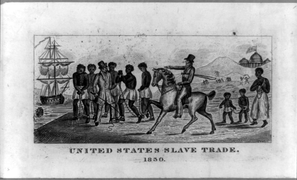 An abolitionist print, possibly engraved in 1830, of slaves in chains, a slave trader on horseback, and the U.S. Capitol in the background.