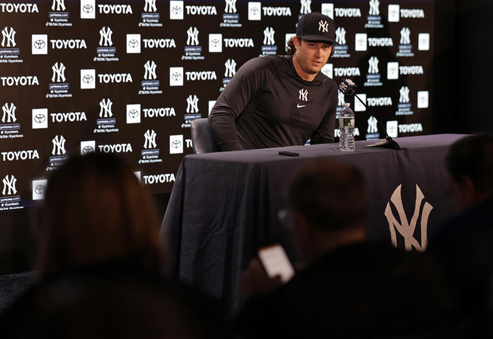 New York Yankees pitcher Gerrit Cole speaks to reporters on Thursday, April 7, 2022, in New York. The Yankees will face the Boston Red Sox in a baseball game on Friday. (AP Photo/Adam Hunger)