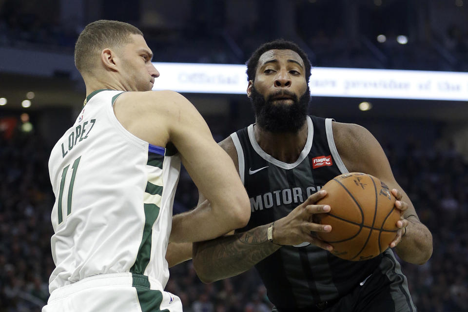 Detroit Pistons' Andre Drummond drives to the basket against Milwaukee Bucks' Brook Lopez during the first half of Game 2 of an NBA basketball first-round playoff series Wednesday, April 17, 2019, in Milwaukee. (AP Photo/Aaron Gash)