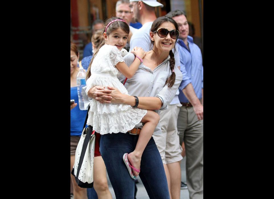 Katie Holmes and her daughter, Suri Cruise, step out in New York City in August 2012.