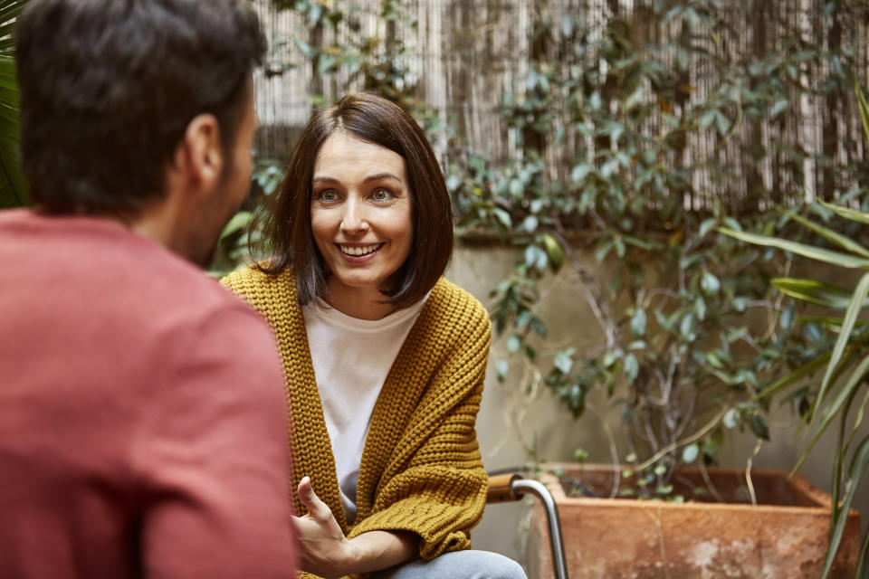 Woman listening to man